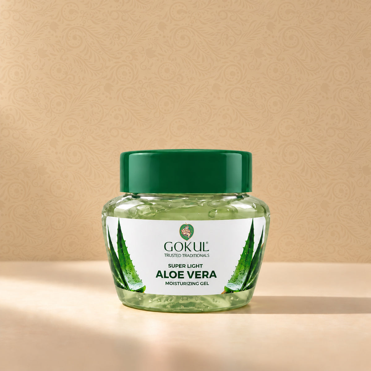 A jar of Gokul Trusted Traditions Super Light Aloe Vera Moisturizing Gel 100 g – front packaging, featuring a green lid and a white label with green aloe vera graphics. 