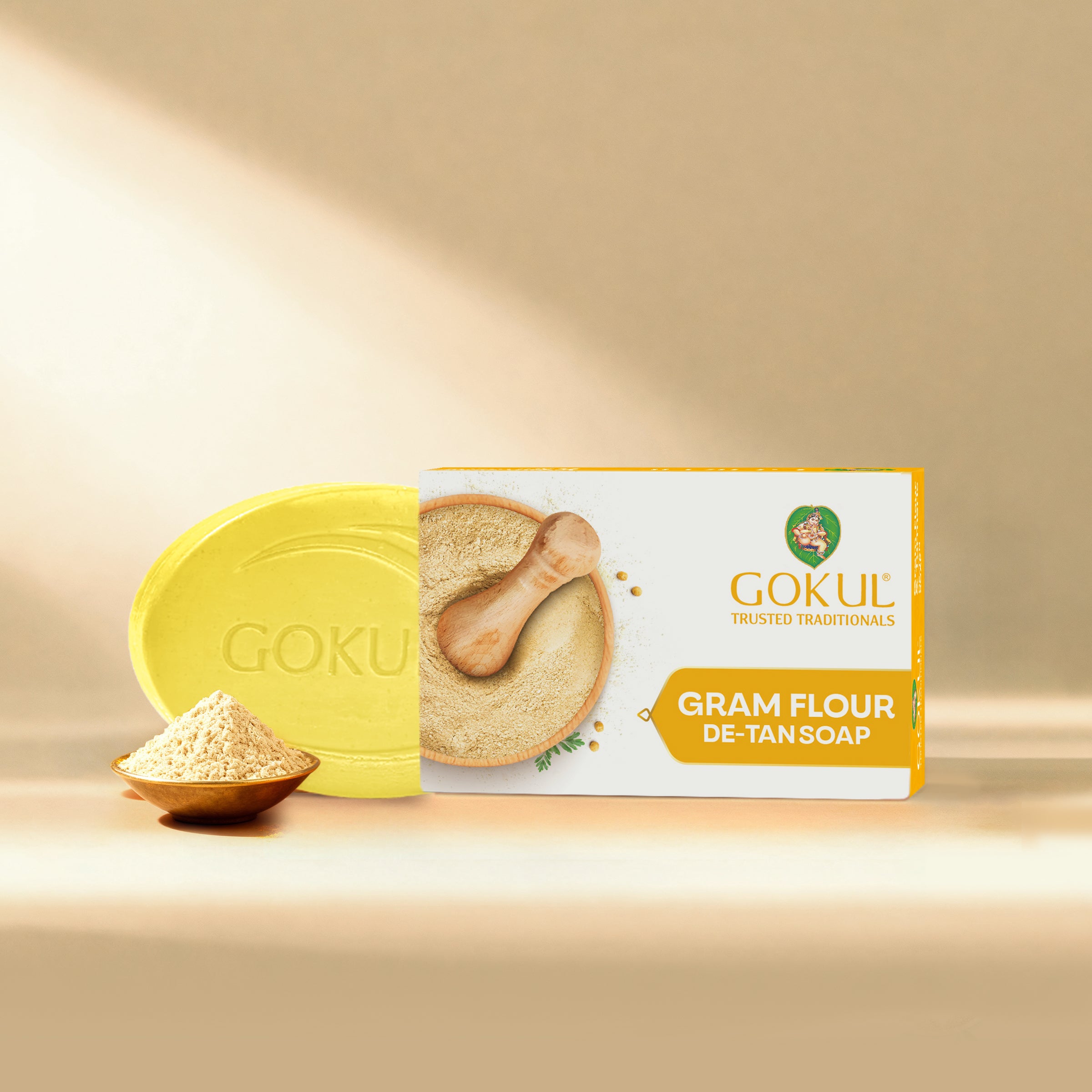 Gokul Gram Flour De-Tan Soap with packaging on a beige background